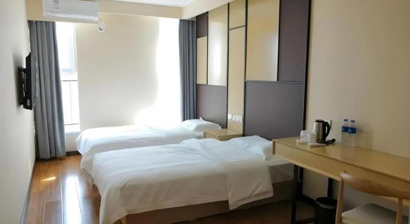 Bed in Shell Taiyuan South Station Shanxi University Hotel