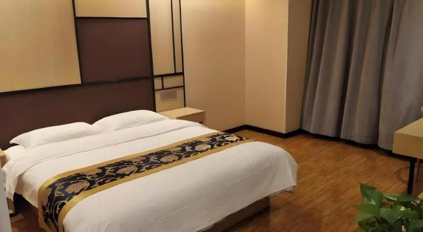 Bed in Shell Taiyuan South Station Shanxi University Hotel