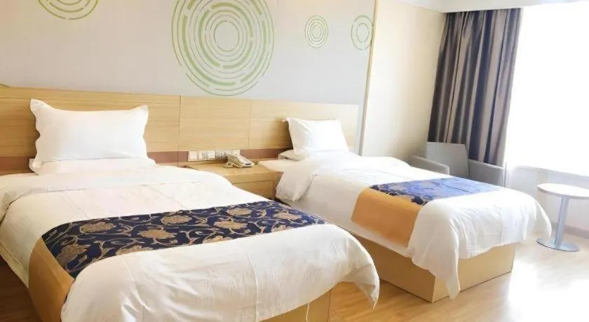 Bed in GreenTree Inn Urumqi Airport Tianyi International City