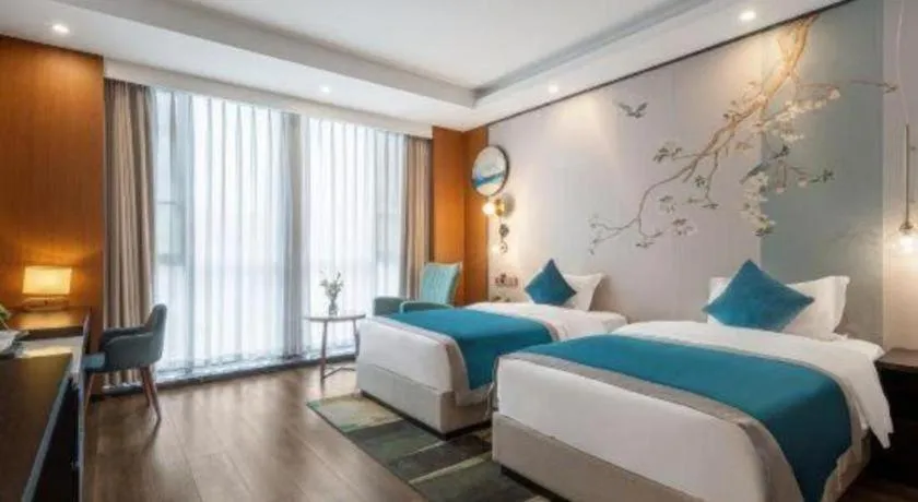 Bed in Shanshui S Hotel Zizhong City Mdl