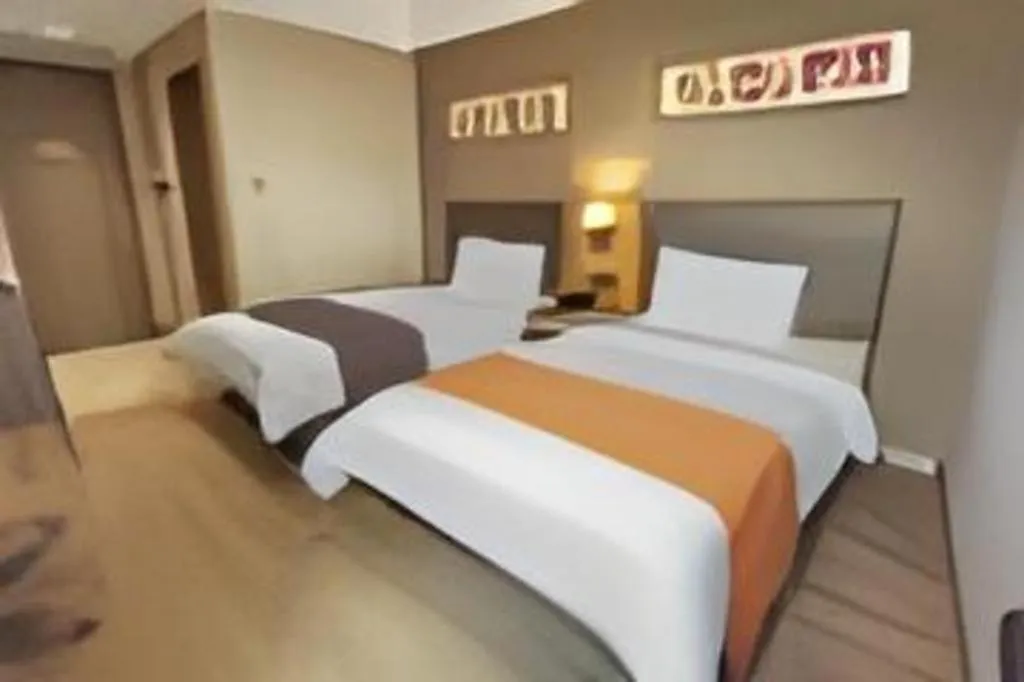 Bed in Home Inn Plus Shanghai Middle Ring Jinshajiang Road Fengzhuang Metro Station