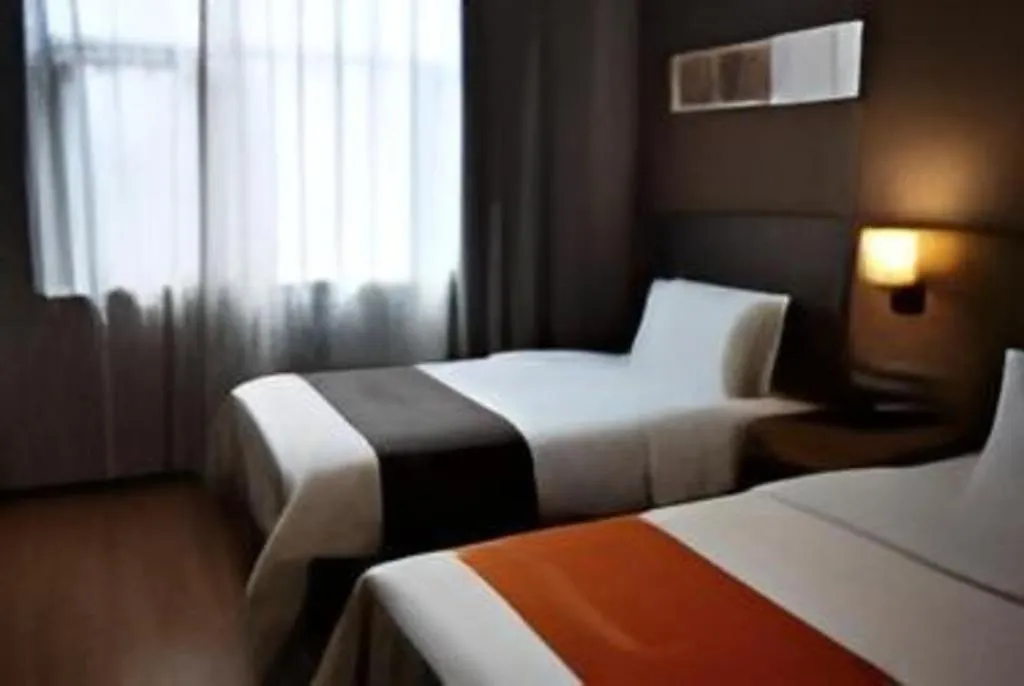 Bed in Home Inn Plus Shanghai Middle Ring Jinshajiang Road Fengzhuang Metro Station