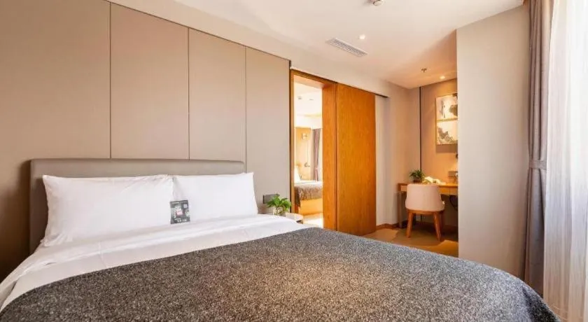 Bed in Yitel Collection Shenyang Hunnan Olympic Sports Center Caixia Street Metro Station