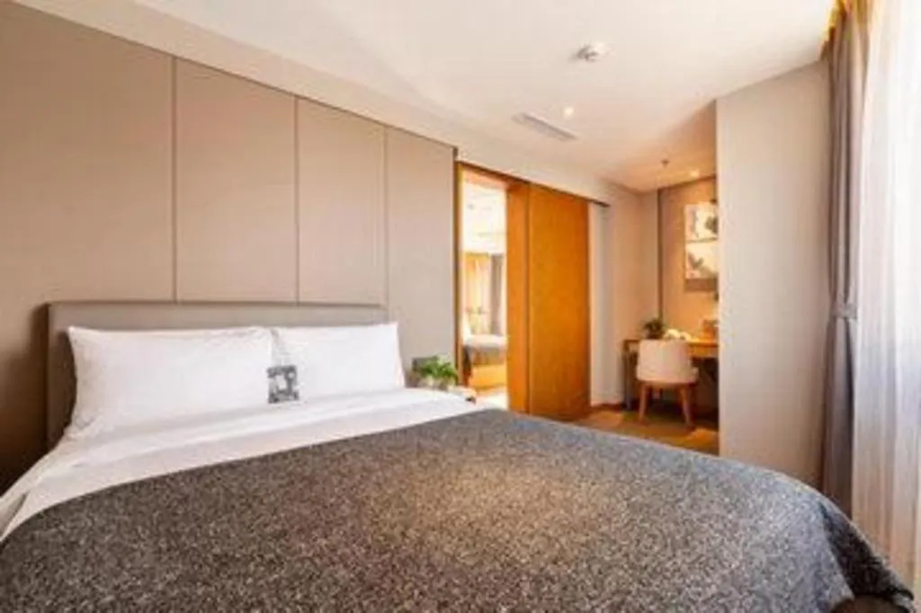 Bed in Yitel Collection Shenyang Hunnan Olympic Sports Center Caixia Street Metro Station