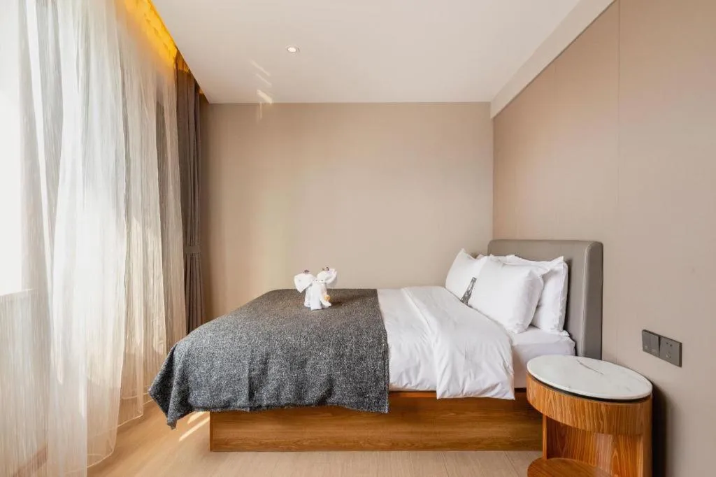 Bed in Yitel Collection Shenyang Hunnan Olympic Sports Center Caixia Street Metro Station