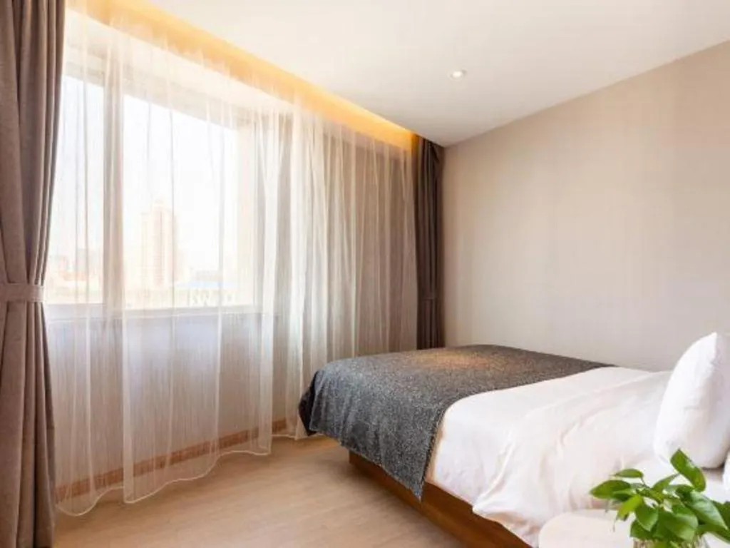 Bed in Yitel Collection Shenyang Hunnan Olympic Sports Center Caixia Street Metro Station