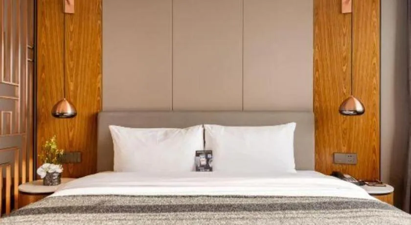 Bed in Yitel Collection Shenyang Hunnan Olympic Sports Center Caixia Street Metro Station