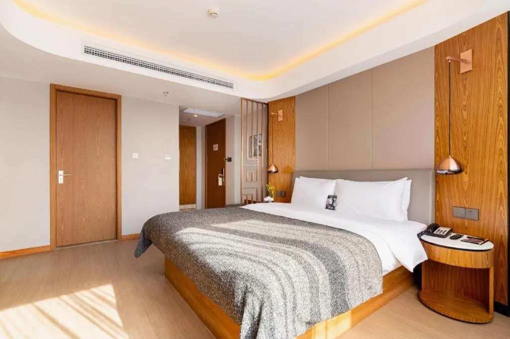 Bed in Yitel Collection Shenyang Hunnan Olympic Sports Center Caixia Street Metro Station