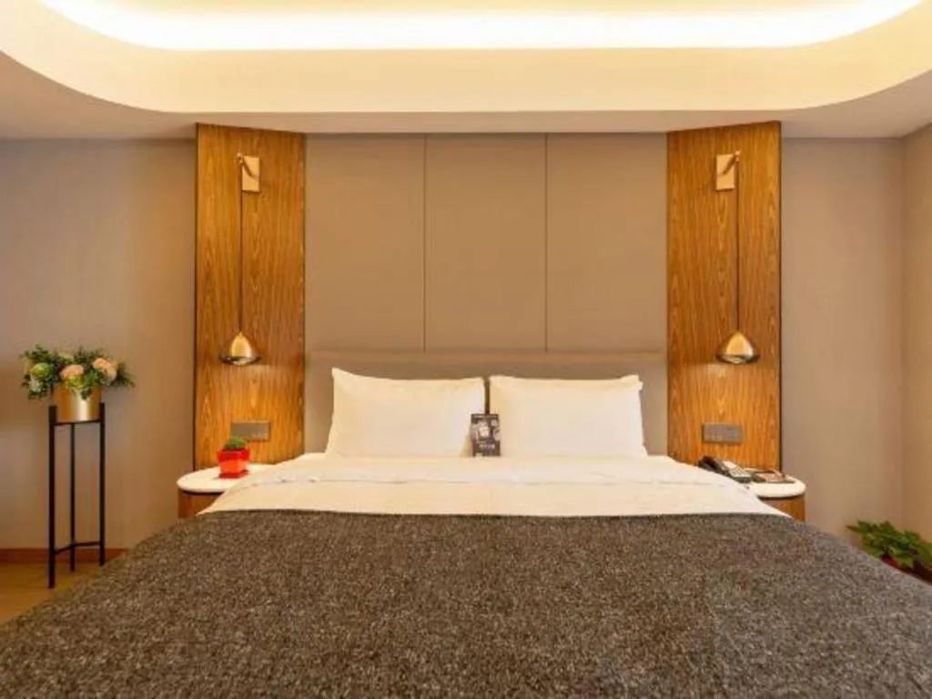 Bed in Yitel Collection Shenyang Hunnan Olympic Sports Center Caixia Street Metro Station