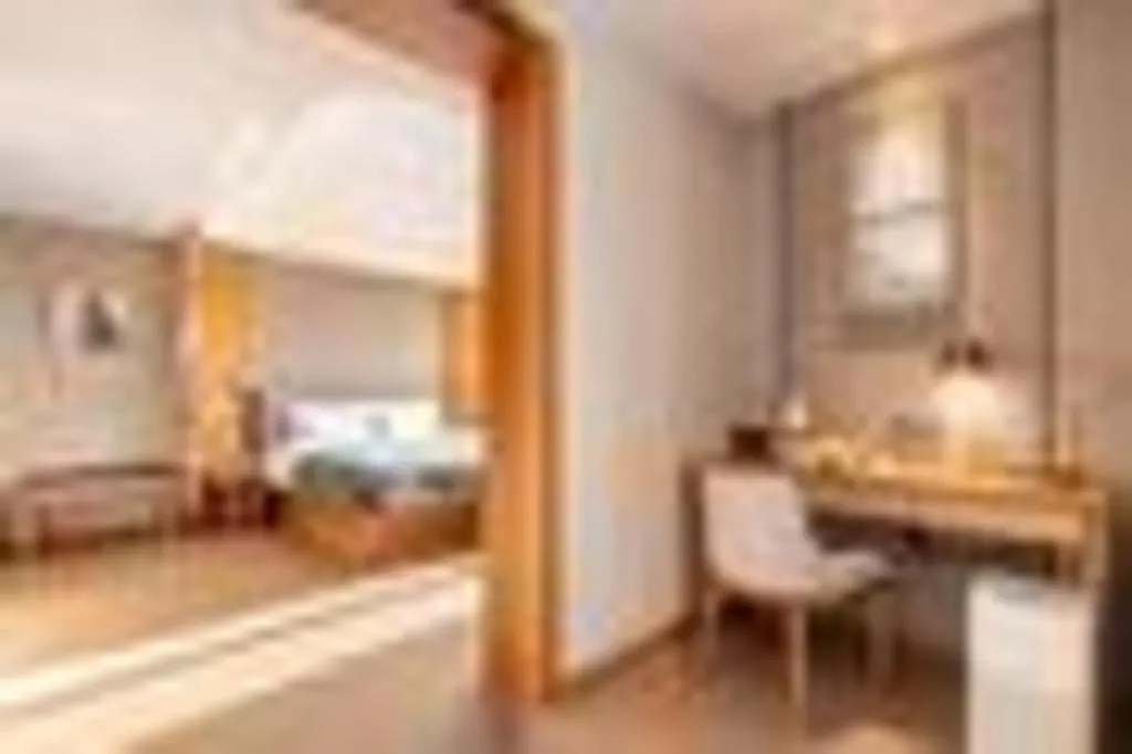 Bed in Yitel Collection Shenyang Hunnan Olympic Sports Center Caixia Street Metro Station