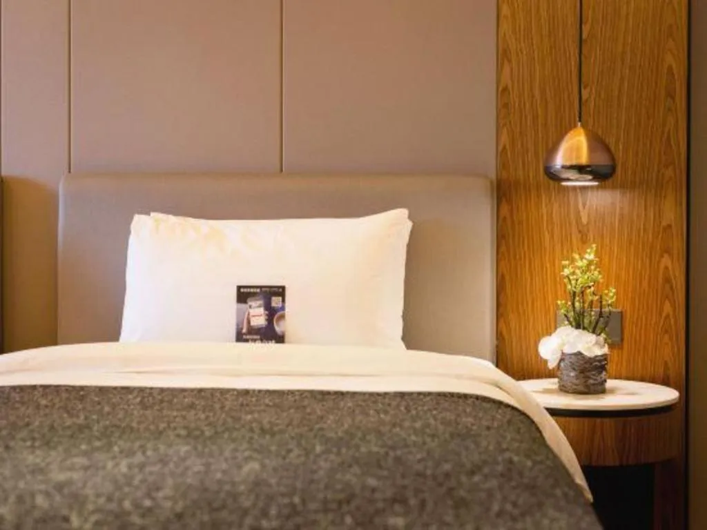 Bed in Yitel Collection Shenyang Hunnan Olympic Sports Center Caixia Street Metro Station