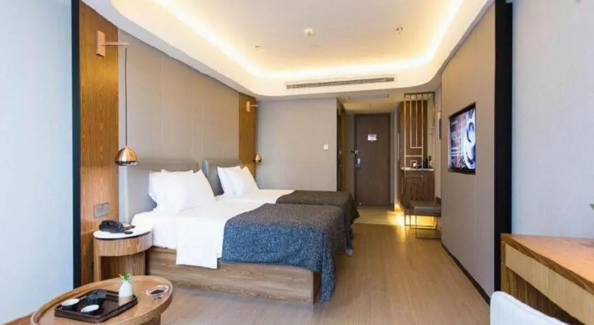 Bed in Yitel Collection Shenyang Hunnan Olympic Sports Center Caixia Street Metro Station