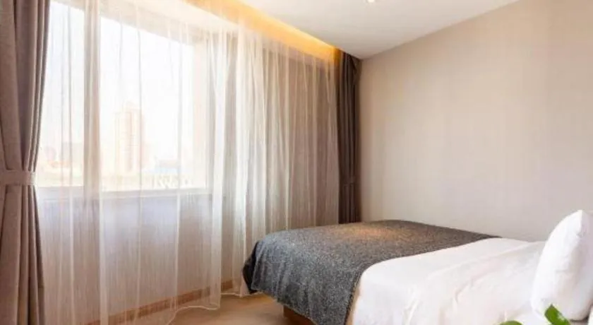 Bed in Yitel Collection Shenyang Hunnan Olympic Sports Center Caixia Street Metro Station