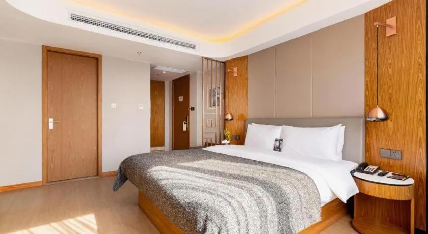 Bed in Yitel Collection Shenyang Hunnan Olympic Sports Center Caixia Street Metro Station