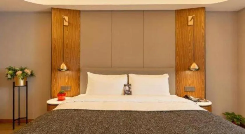 Bed in Yitel Collection Shenyang Hunnan Olympic Sports Center Caixia Street Metro Station