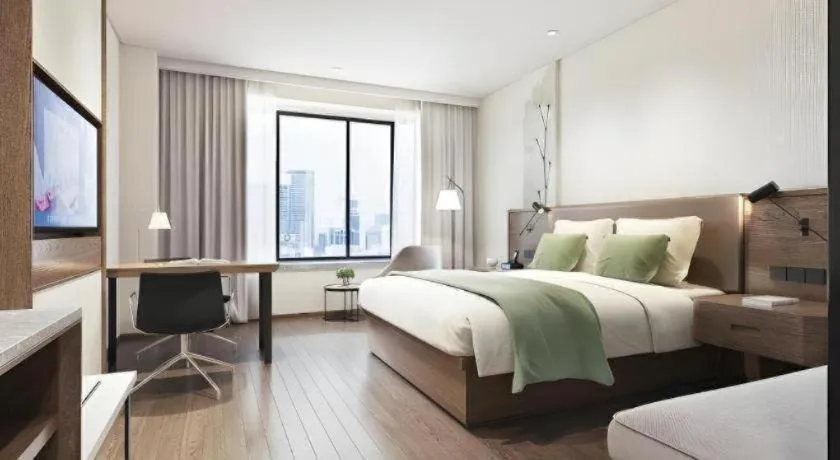 Bed in GreenTree Inn Ganzhou Gan County Bus Station