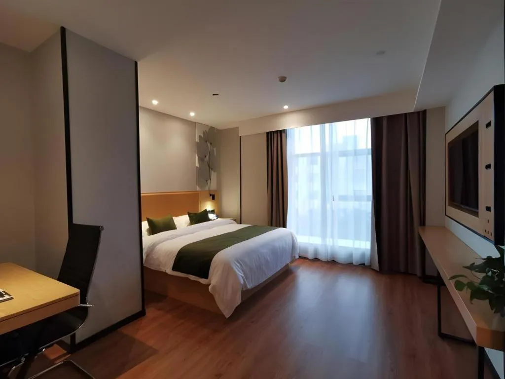 Bed in GreenTree Inn Ganzhou Gan County Bus Station