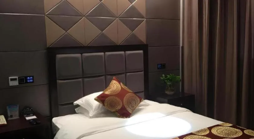 Bed in GreenTree Inn Wuxi Xinwu District Meicun Town Taibo Avenue
