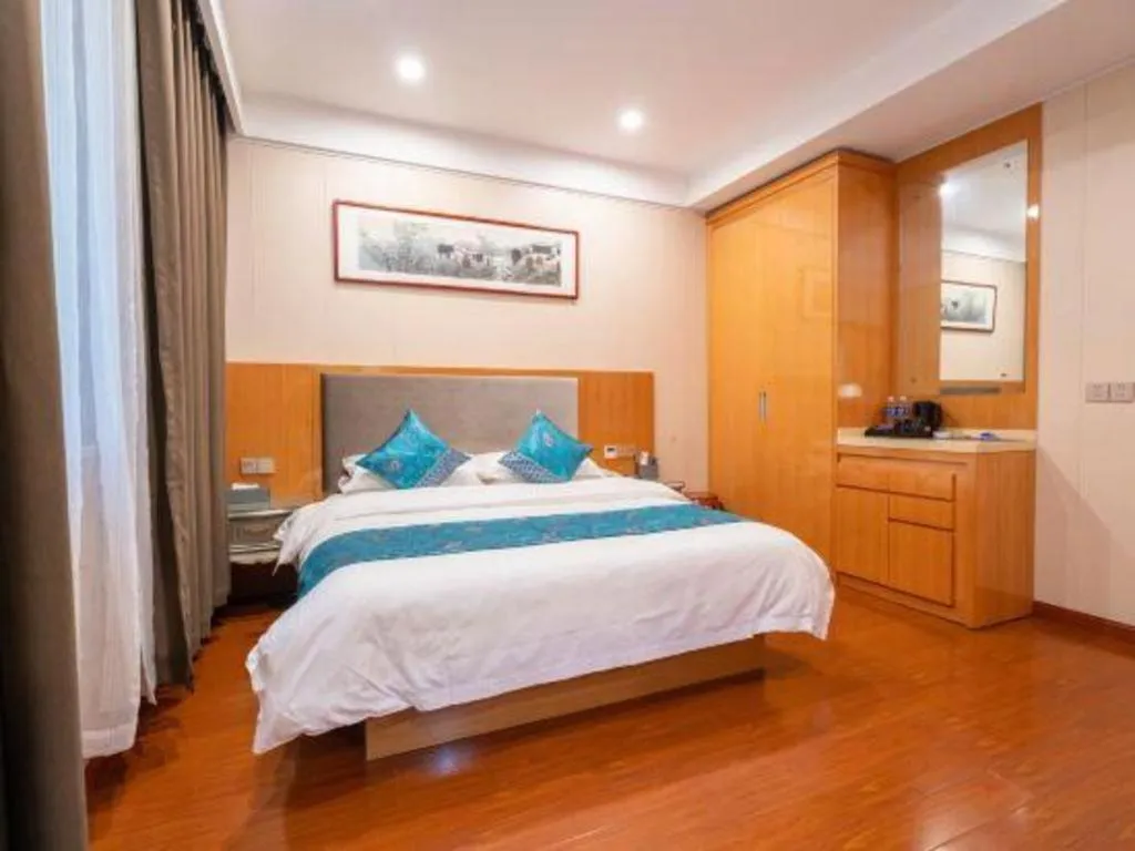 Bed in GreenTree Inn Wuxi Xinwu District Meicun Town Taibo Avenue