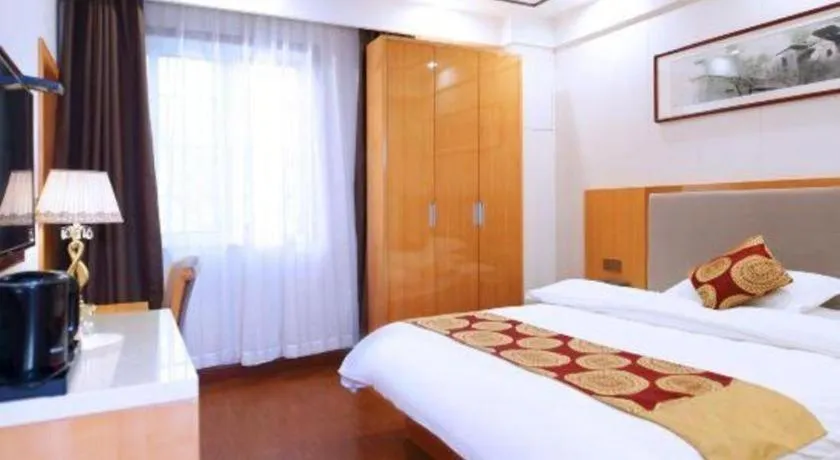 Bed in GreenTree Inn Wuxi Xinwu District Meicun Town Taibo Avenue