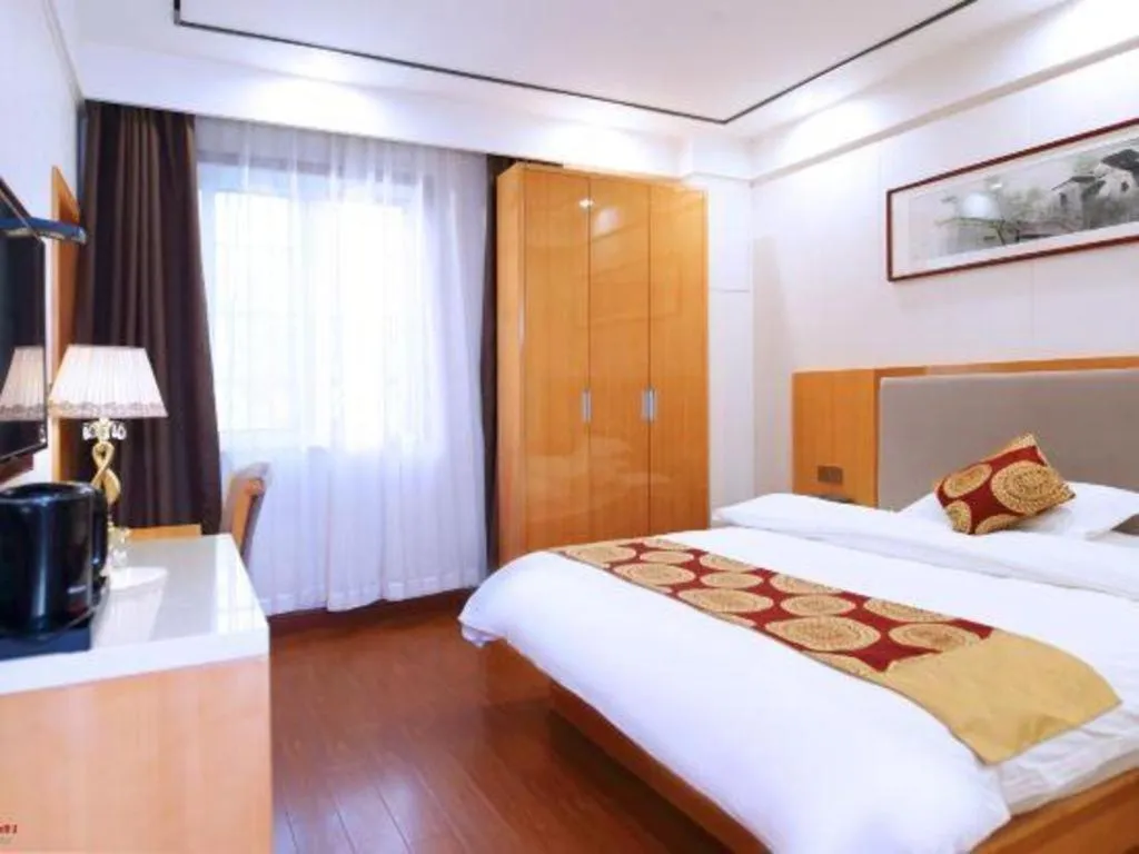Bed in GreenTree Inn Wuxi Xinwu District Meicun Town Taibo Avenue
