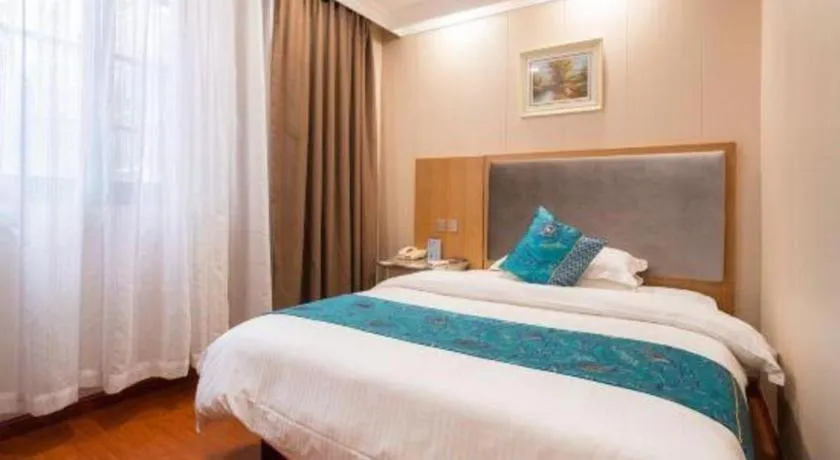 Bed in GreenTree Inn Wuxi Xinwu District Meicun Town Taibo Avenue