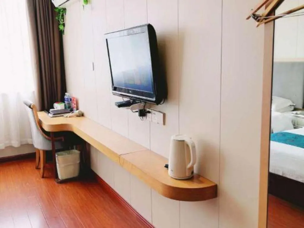 Bed in GreenTree Inn Wuxi Xinwu District Meicun Town Taibo Avenue