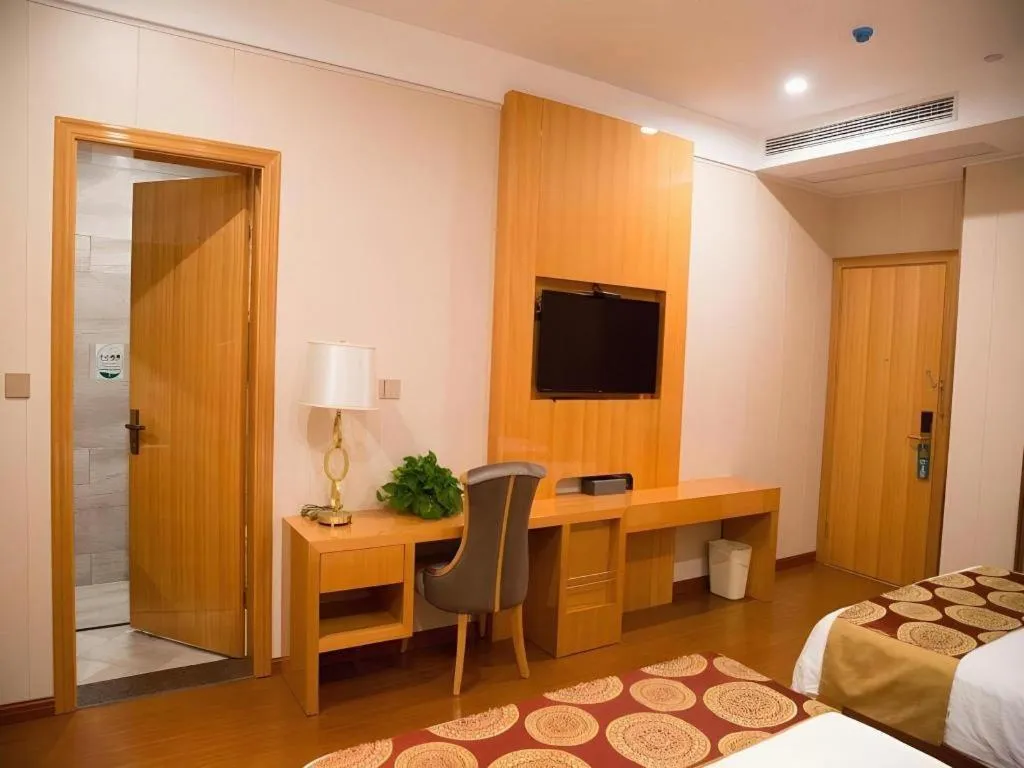 Bed in GreenTree Inn Wuxi Xinwu District Meicun Town Taibo Avenue