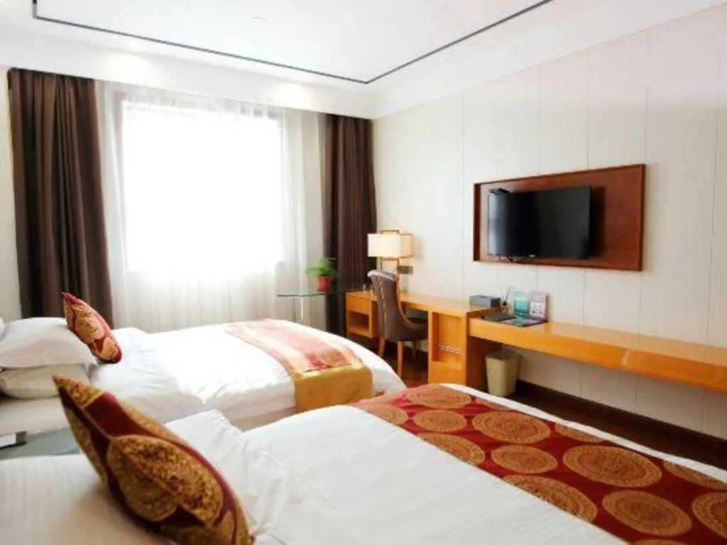 Bed in GreenTree Inn Wuxi Xinwu District Meicun Town Taibo Avenue