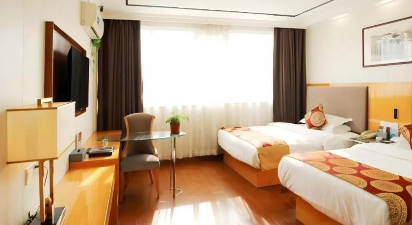 Bed in GreenTree Inn Wuxi Xinwu District Meicun Town Taibo Avenue