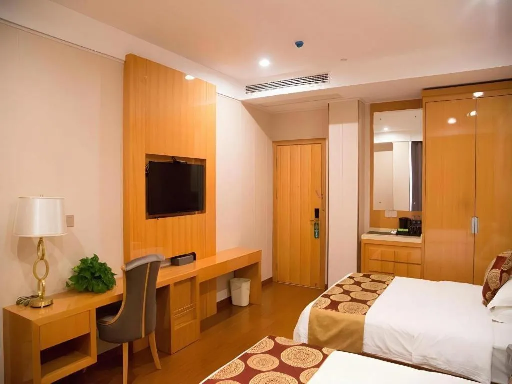 Bed in GreenTree Inn Wuxi Xinwu District Meicun Town Taibo Avenue