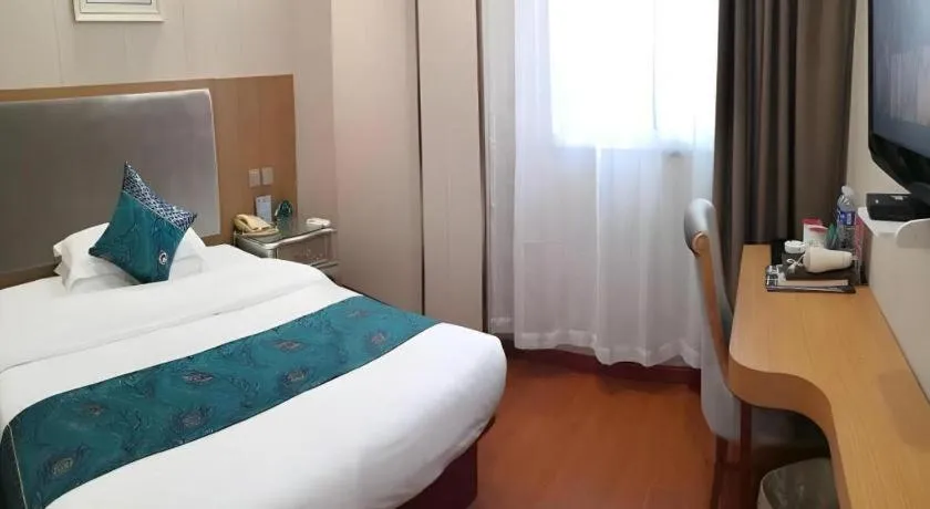 Bed in GreenTree Inn Wuxi Xinwu District Meicun Town Taibo Avenue