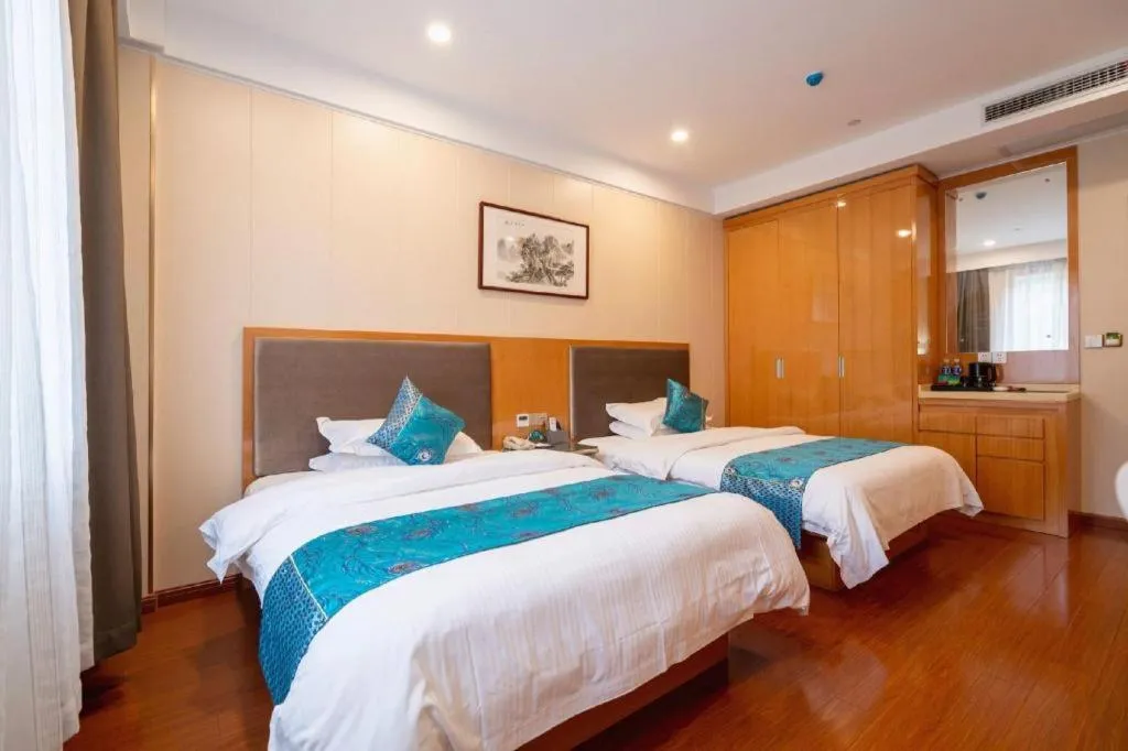 Bed in GreenTree Inn Wuxi Xinwu District Meicun Town Taibo Avenue