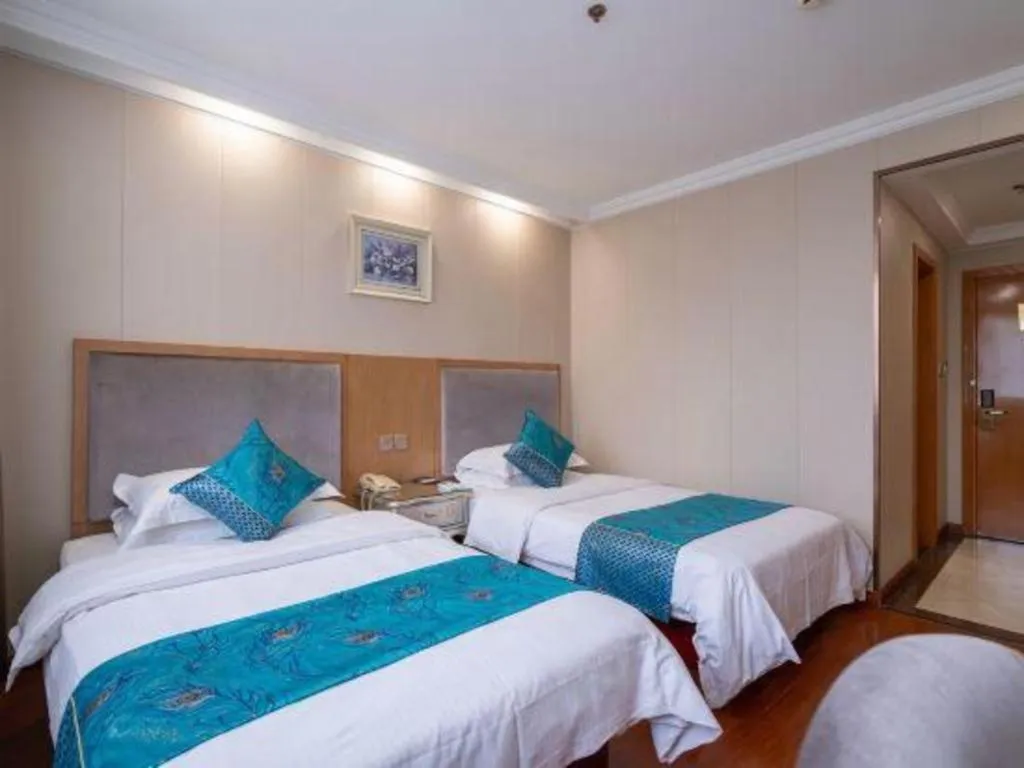 Bed in GreenTree Inn Wuxi Xinwu District Meicun Town Taibo Avenue