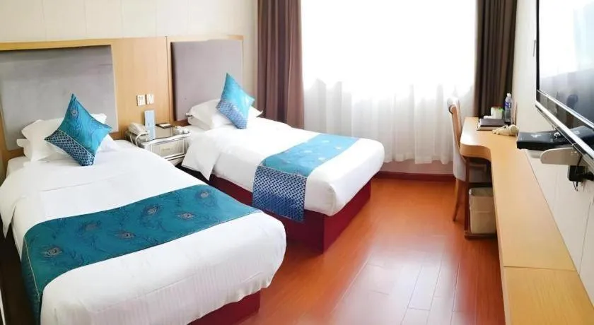 Bed in GreenTree Inn Wuxi Xinwu District Meicun Town Taibo Avenue