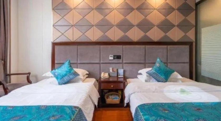 Bed in GreenTree Inn Wuxi Xinwu District Meicun Town Taibo Avenue