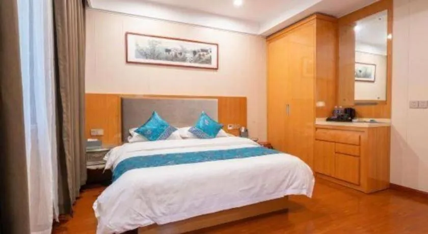Bed in GreenTree Inn Wuxi Xinwu District Meicun Town Taibo Avenue
