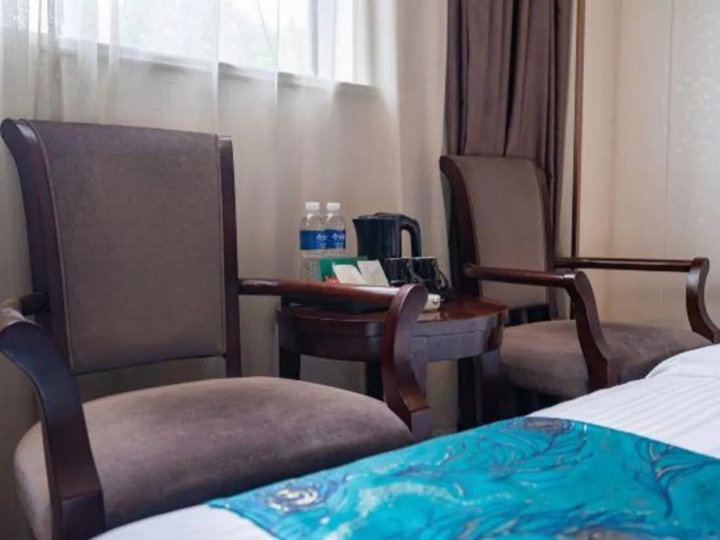 Bed in GreenTree Inn Wuxi Xinwu District Meicun Town Taibo Avenue