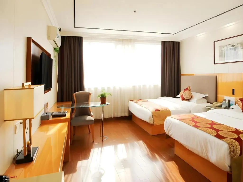 Bed in GreenTree Inn Wuxi Xinwu District Meicun Town Taibo Avenue