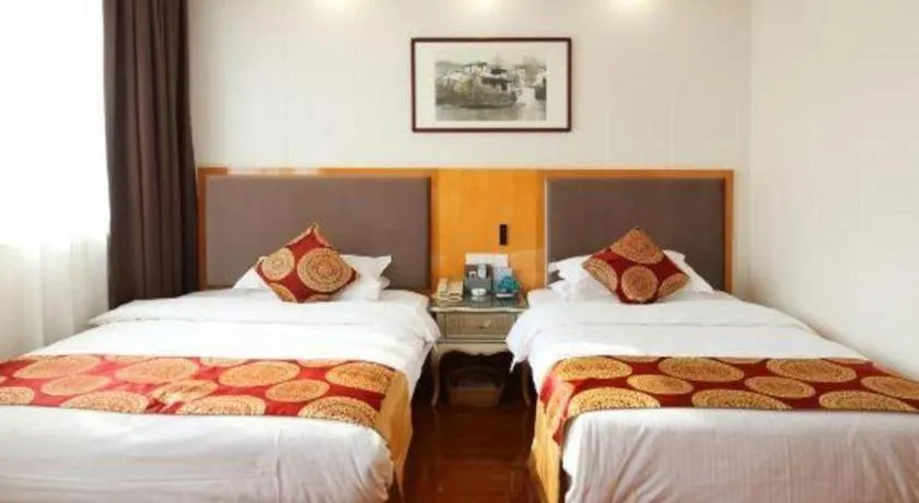 Bed in GreenTree Inn Wuxi Xinwu District Meicun Town Taibo Avenue