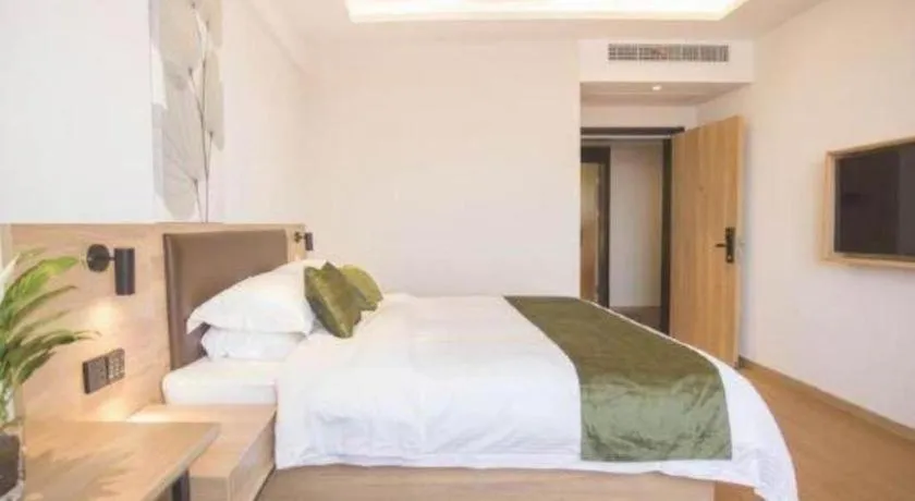 Bed in GreenTree Inn Express Taizhou Jiangyan Hardware City