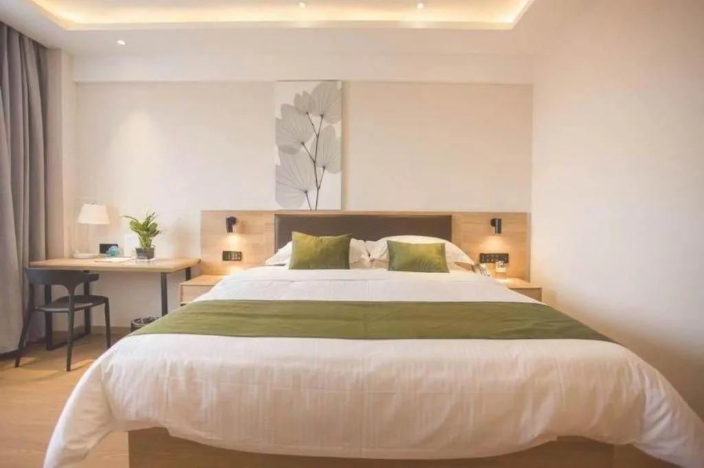 Bed in GreenTree Inn Express Taizhou Jiangyan Hardware City