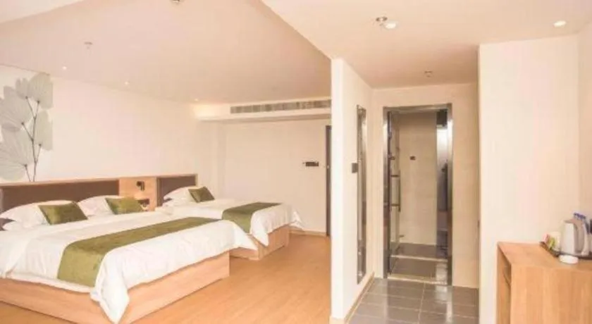 Bed in GreenTree Inn Express Taizhou Jiangyan Hardware City