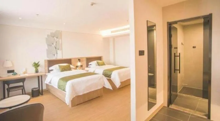 Bed in GreenTree Inn Express Taizhou Jiangyan Hardware City