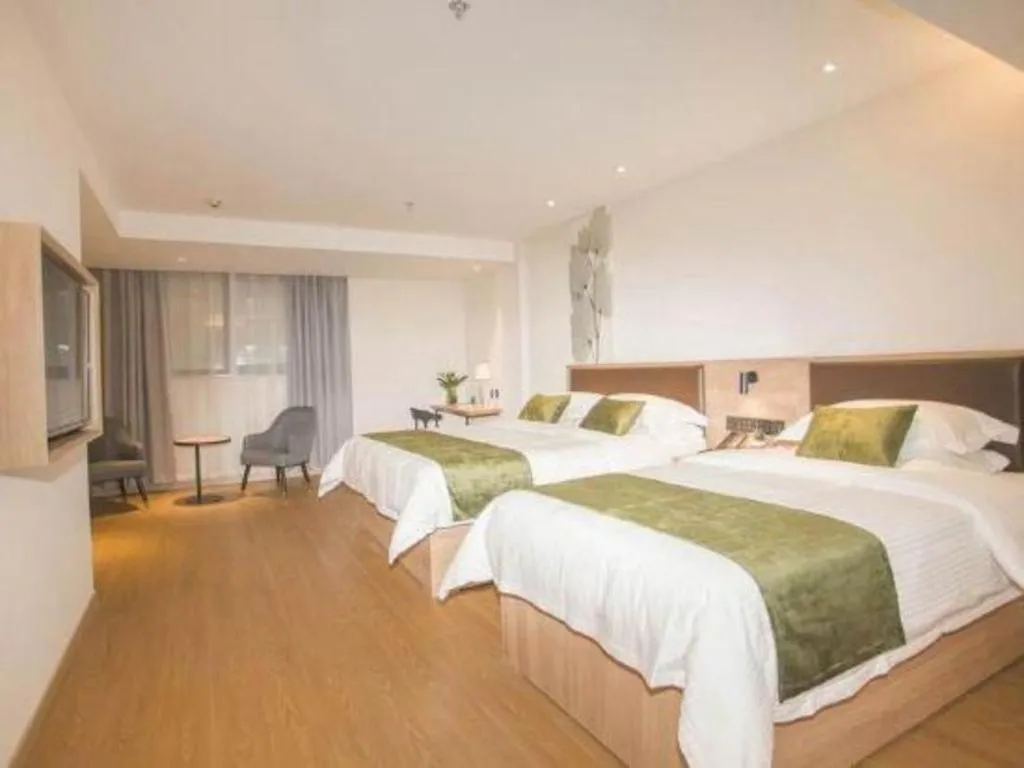 Bed in GreenTree Inn Express Taizhou Jiangyan Hardware City