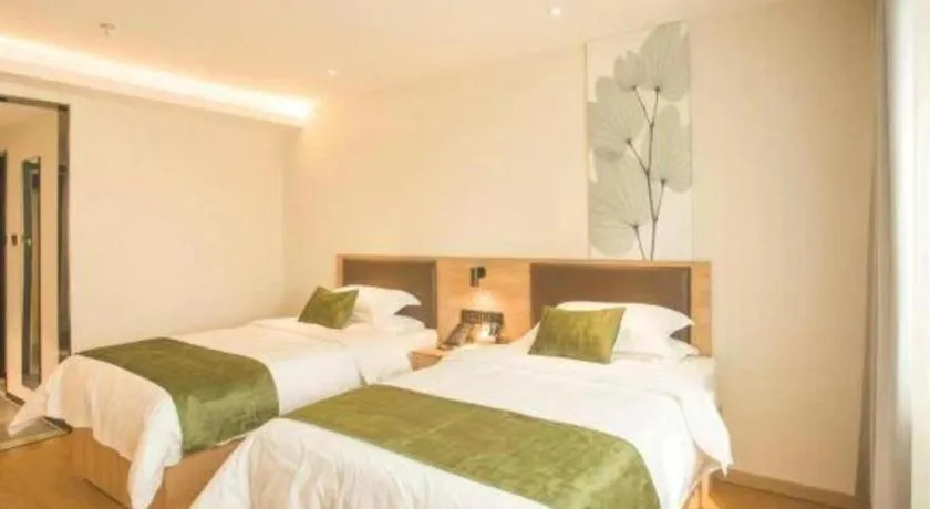 Bed in GreenTree Inn Express Taizhou Jiangyan Hardware City
