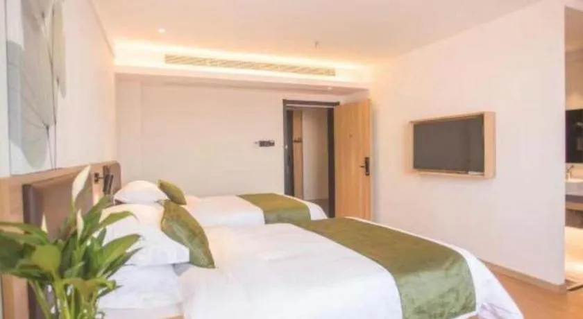 Bed in GreenTree Inn Express Taizhou Jiangyan Hardware City
