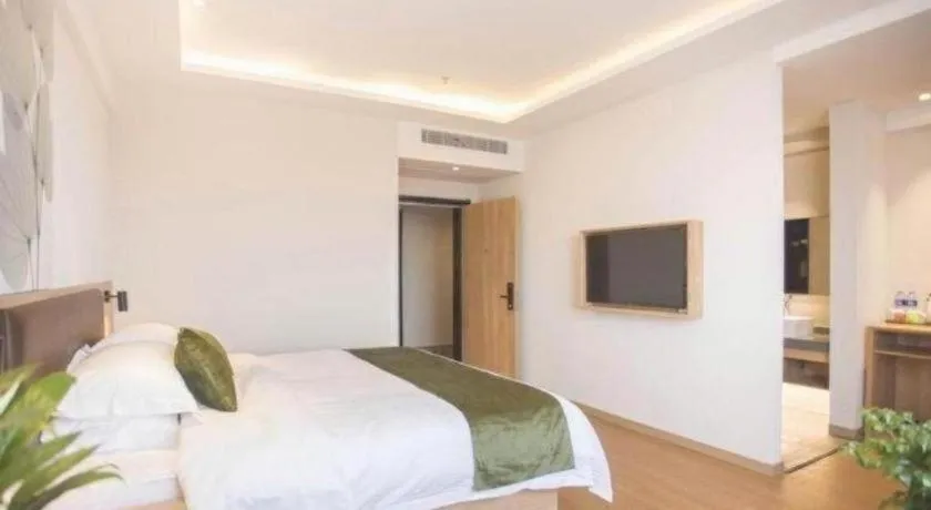 Bed in GreenTree Inn Express Taizhou Jiangyan Hardware City