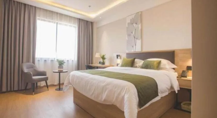 Bed in GreenTree Inn Express Taizhou Jiangyan Hardware City