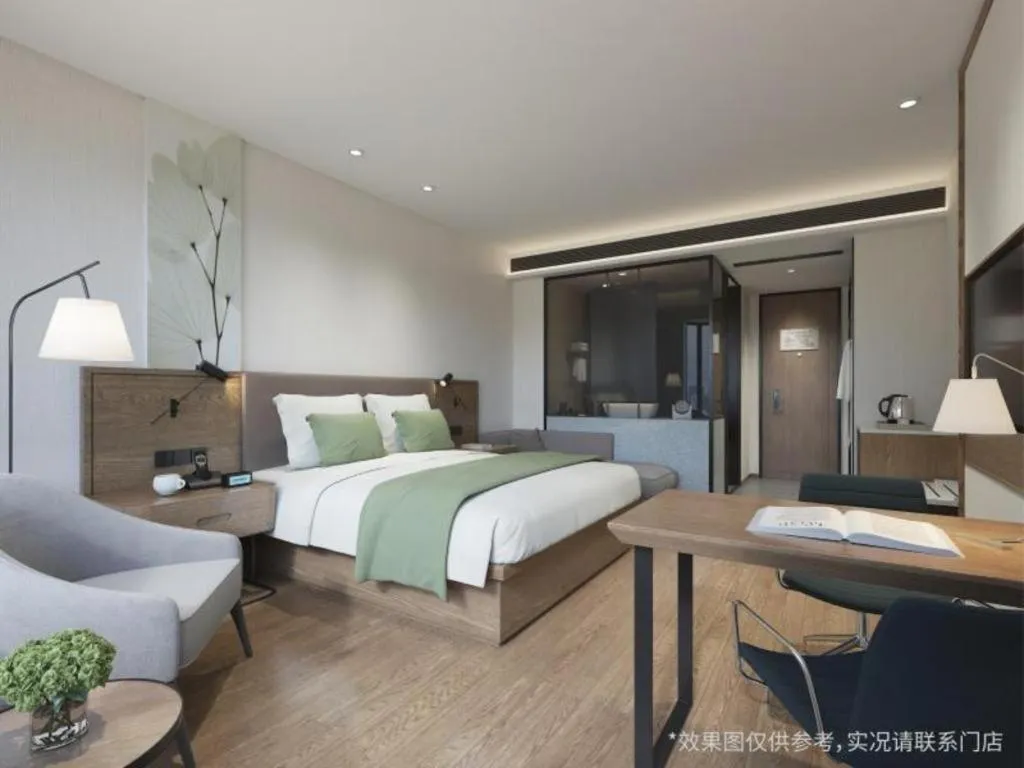 Bed in GreenTree Inn Express Taizhou Jiangyan Hardware City